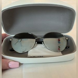 MICHAEL Michael Kors sunglasses with case. Color: silver.